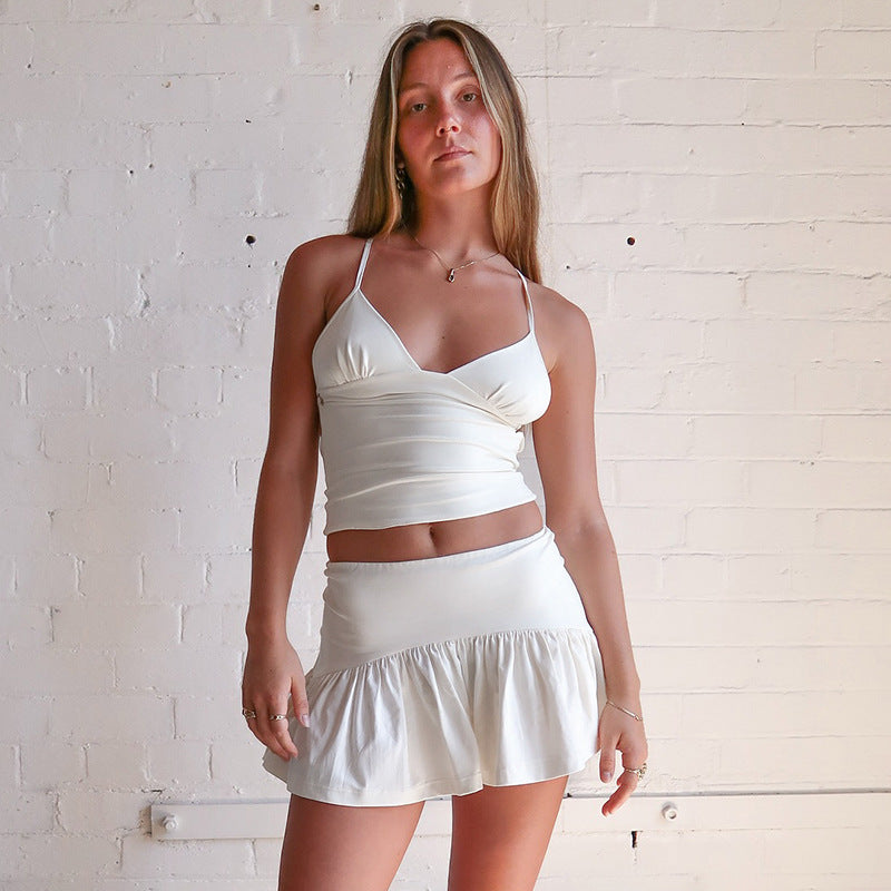 Solid Color And V-neck Hollow Out Strap Short Exercise Skirt Suit